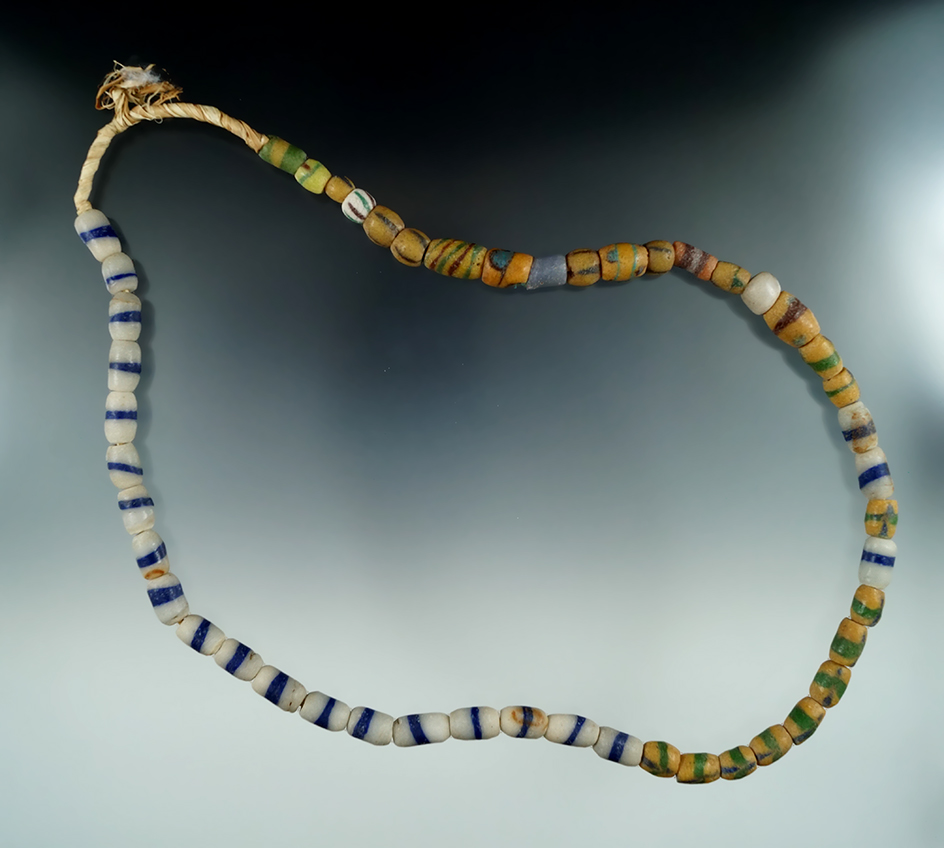 21" Long strand of African sand cast Beads.