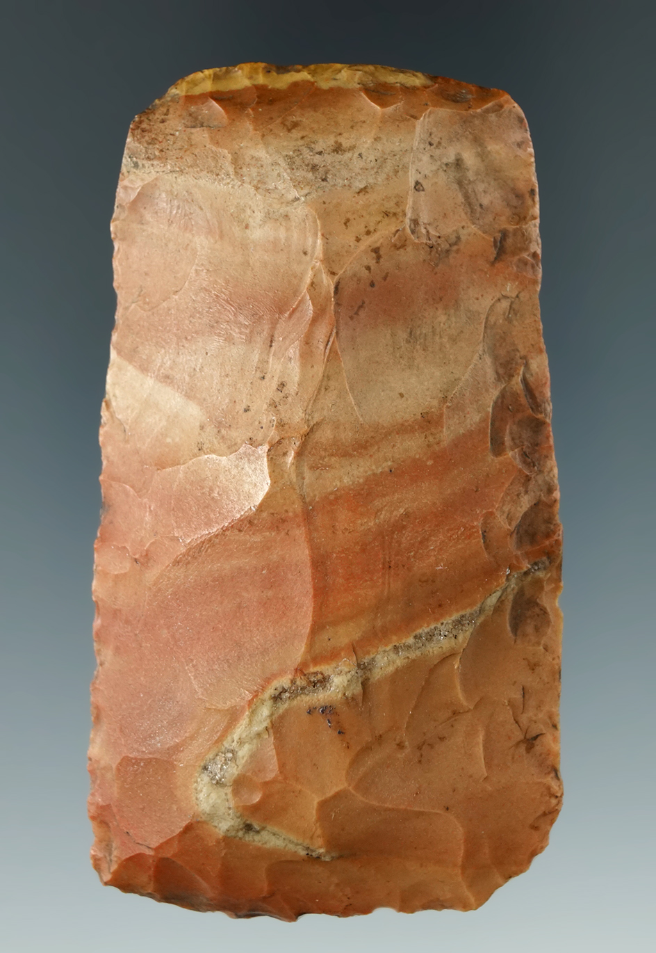 3" Colorful Flint Adze with nicely ground lower edges and base found in Ohio.