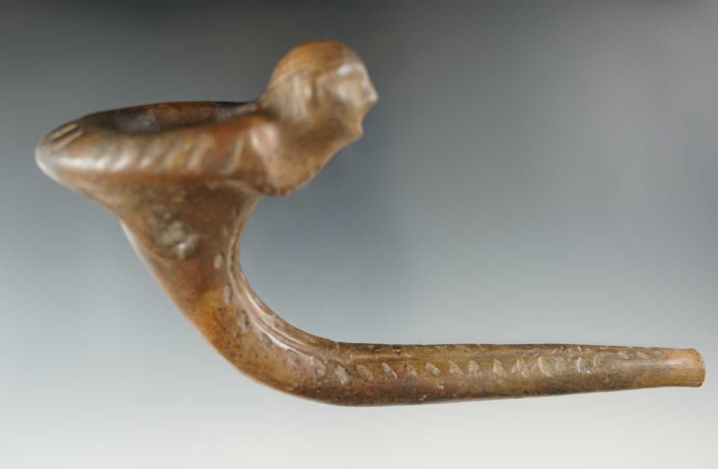 6 1/4" by 3 3/8" Iroquois clay pipe with moderate restoration found in Ontario Co., NY