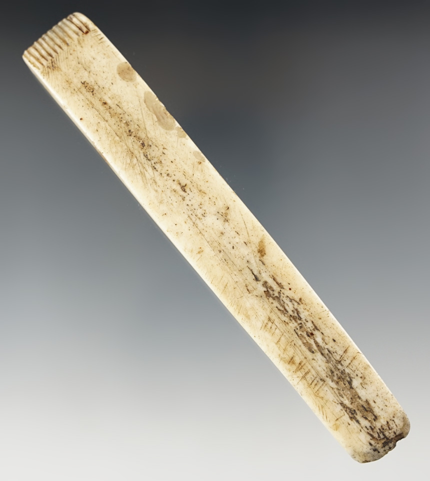 5 3/4" well styled Inuit bone Flesher in excellent condition. From Alaska.
