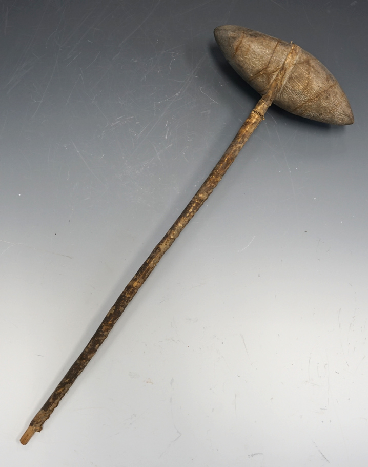 Plains Indian Biconical Stone Club Head with original leather wrapped wood handle.