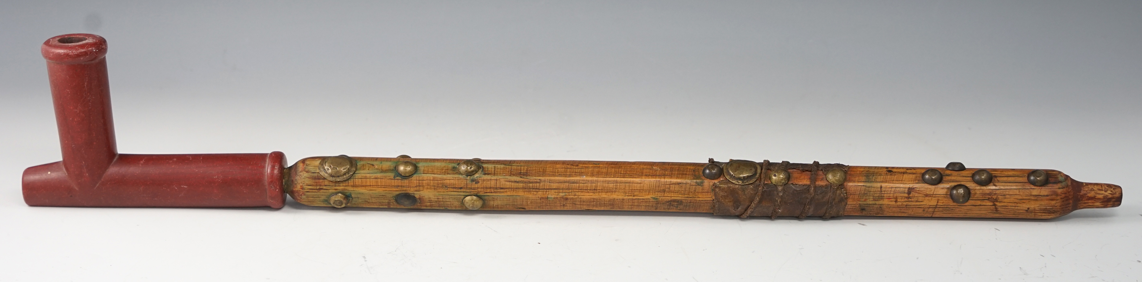 Vintage Catlinite Pipe with original wood stem. Circa late 1800's - early 1900's.