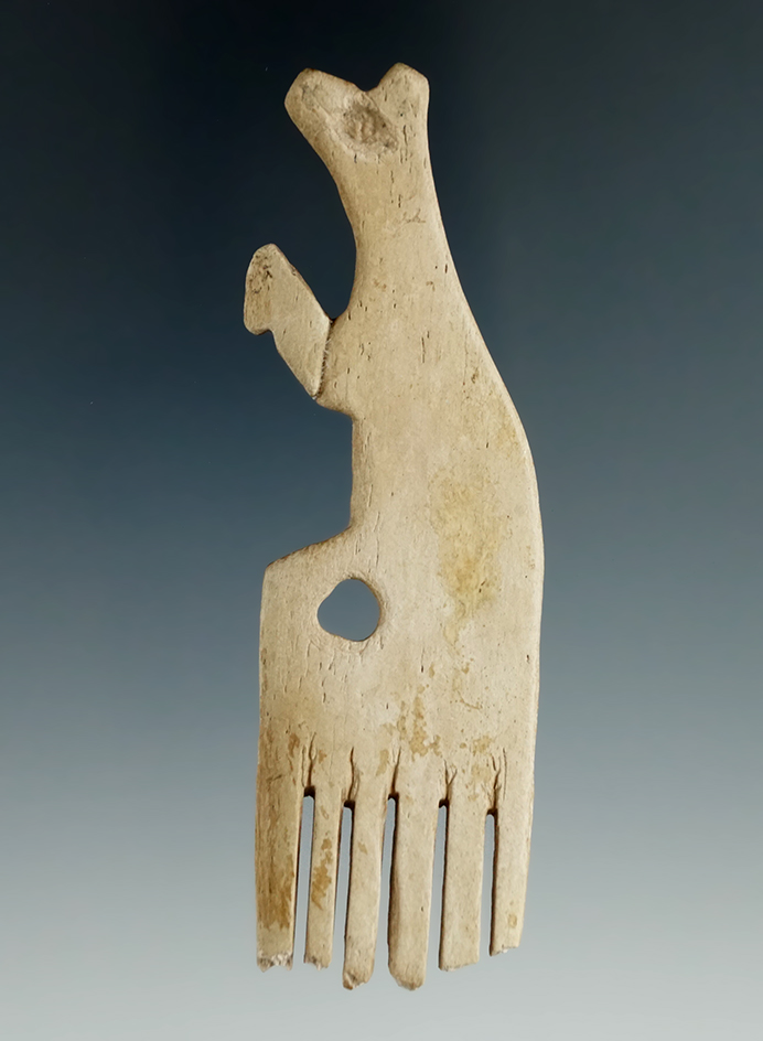 Nice! 3 1/2" Bear Effigy Bone Comb that is broken and glued in one place.  Found in New York.