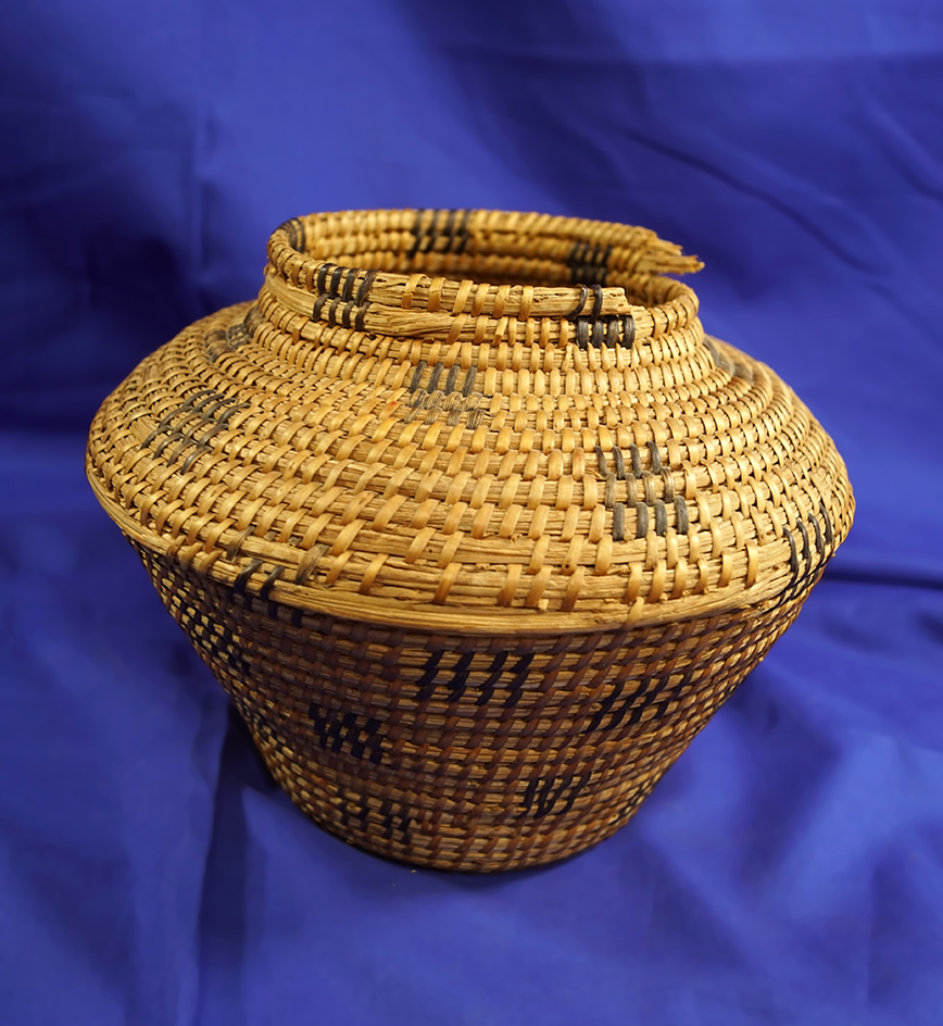 6 1/4" tall x 8 1/4" wide Pima Basket with minor rim damage but still displays nicely.