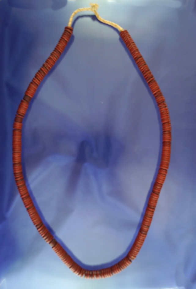 24" strand of drilled African stone beads.