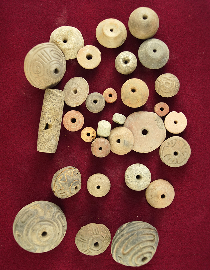 Large group of 31 assorted Pre-Columbian clay beads and spindle whorls found in Mexico.