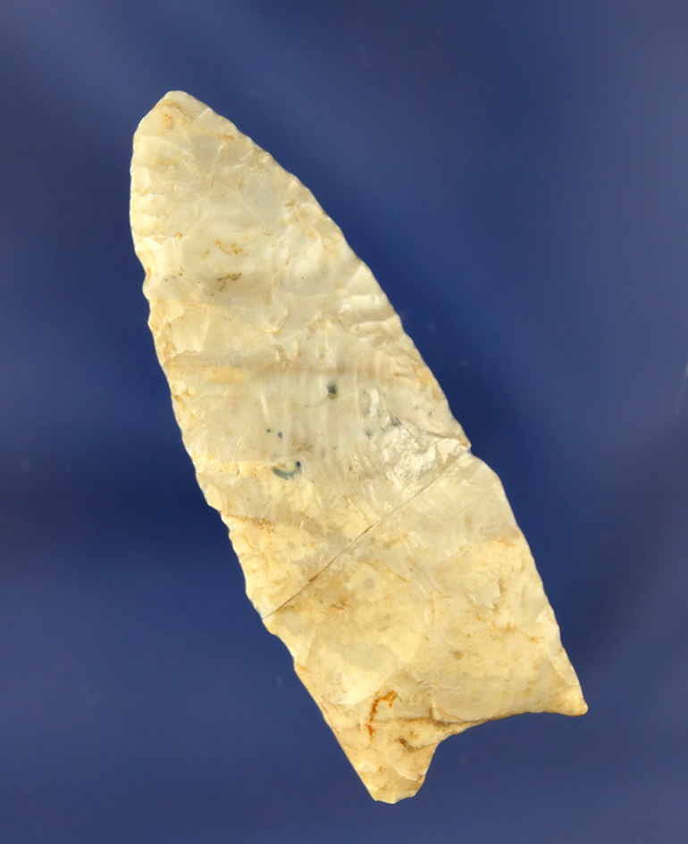 2 1/2" Paleo Clovis that is broken and glued at the midsection found in Greene County Indiana.