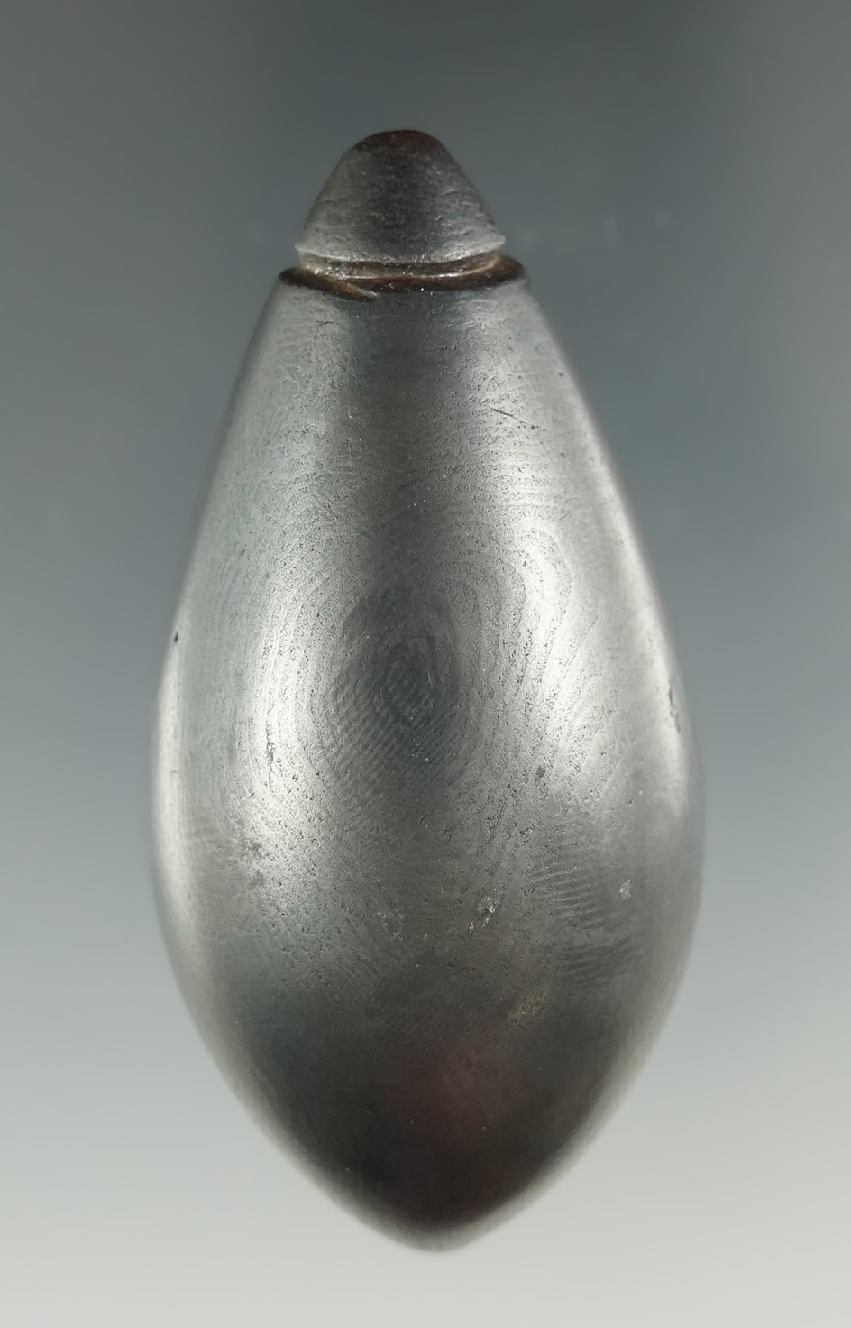 2 9/16" Woodland Plummet made from black Hematite, found in Ohio. Pictured in Who’s Who #7.