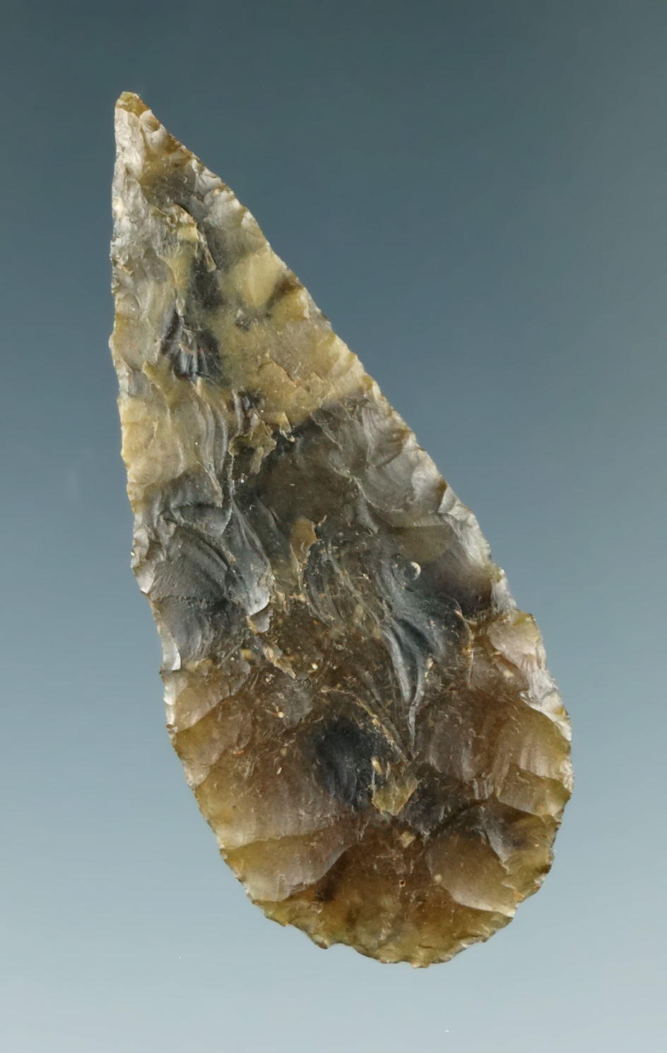 Excellent flaking on this 1 15/16" leaf shaped Neolithic point found in Yorkshire, England.