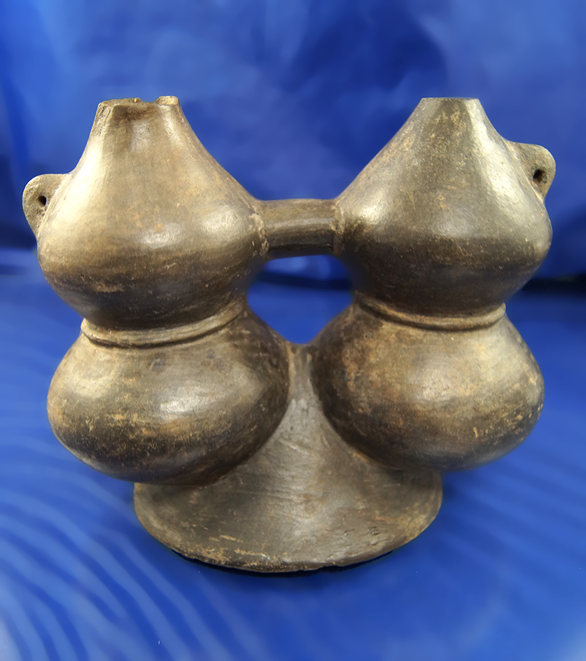 4 7/8" Tall by 6 1/4" Wide Compound style Blackware bottle with minor repairs, Peru.