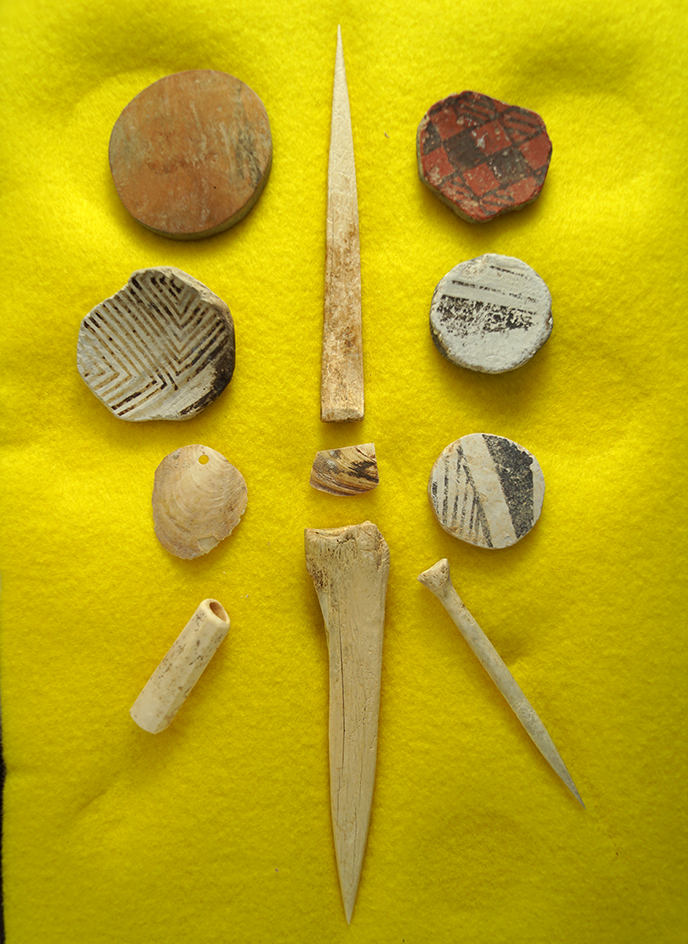 Unique set of artifacts including salvage pottery discs and bone relics - Witch Well, Arizona.
