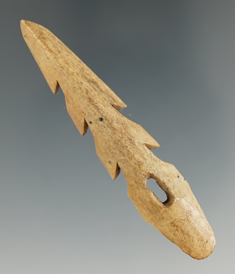 2 13/16" Inuit bone harpoon tip with an old nick to the tip area and nice barbs found in Alaska.