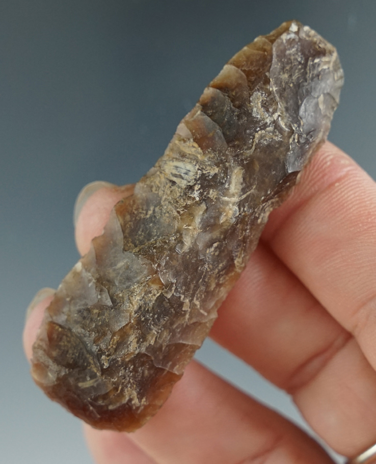 2 1/2" nicely patinated Knife River Flint Knife/scraper  found in North Dakota. Ex. Karl Parcher.