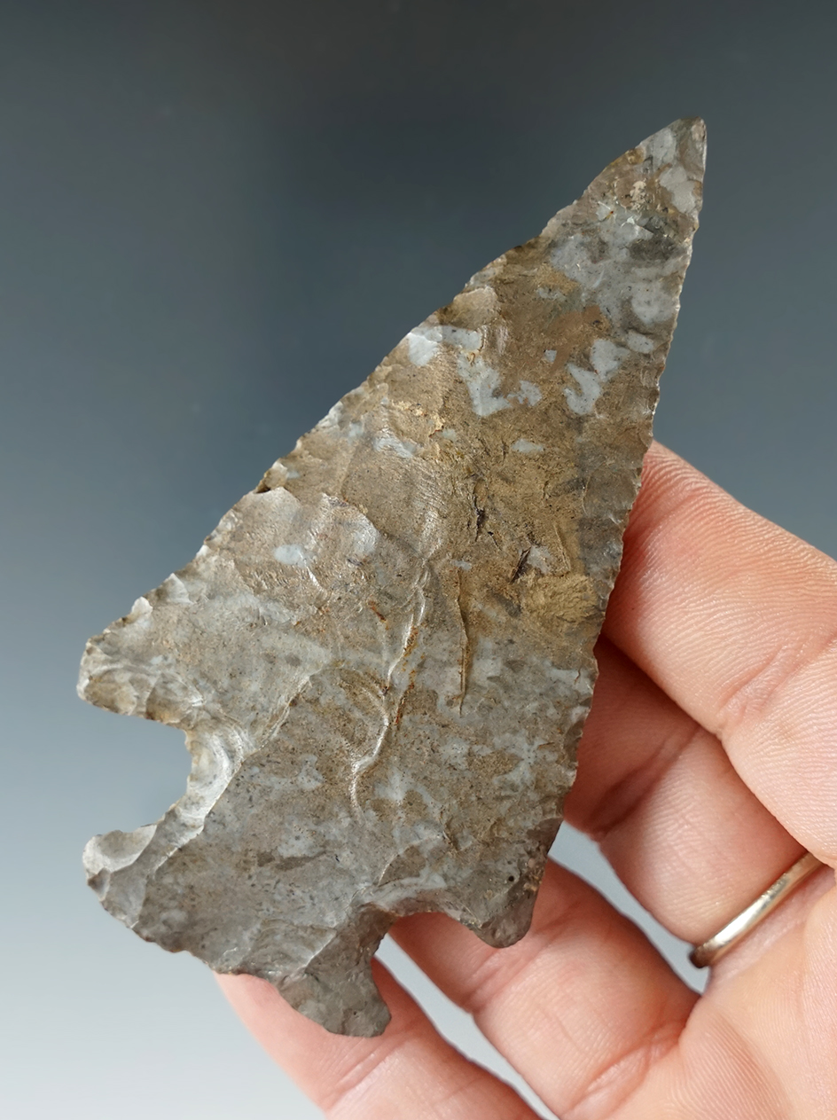 3 1/2" Hopewell Knife with restoration to the tip, one ear and one corner of base.  Onondaga Flint.