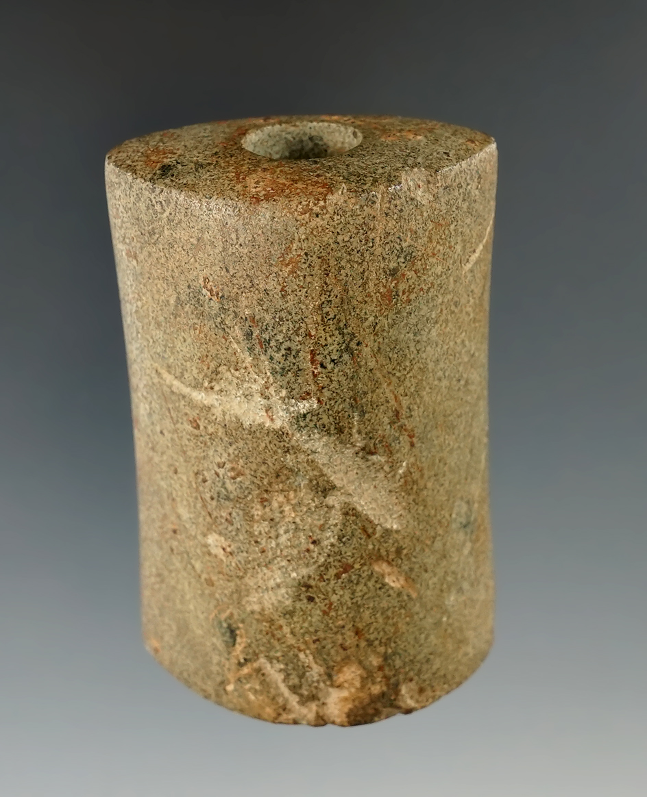 2 11/16" Hardstone "D" Bannerstone that is drilled half way but not completed. Found in Illinois.