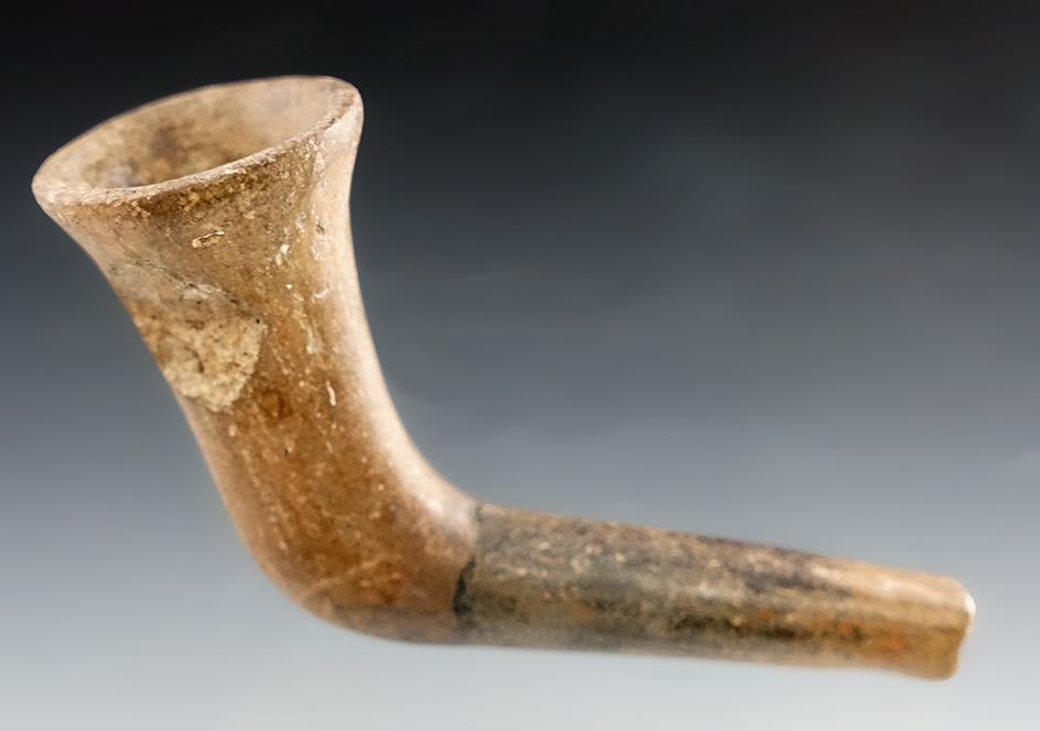 3 1/4" Iroquois Clay Trumpet Pipe that is broken and reglued at the elbow found in New York.