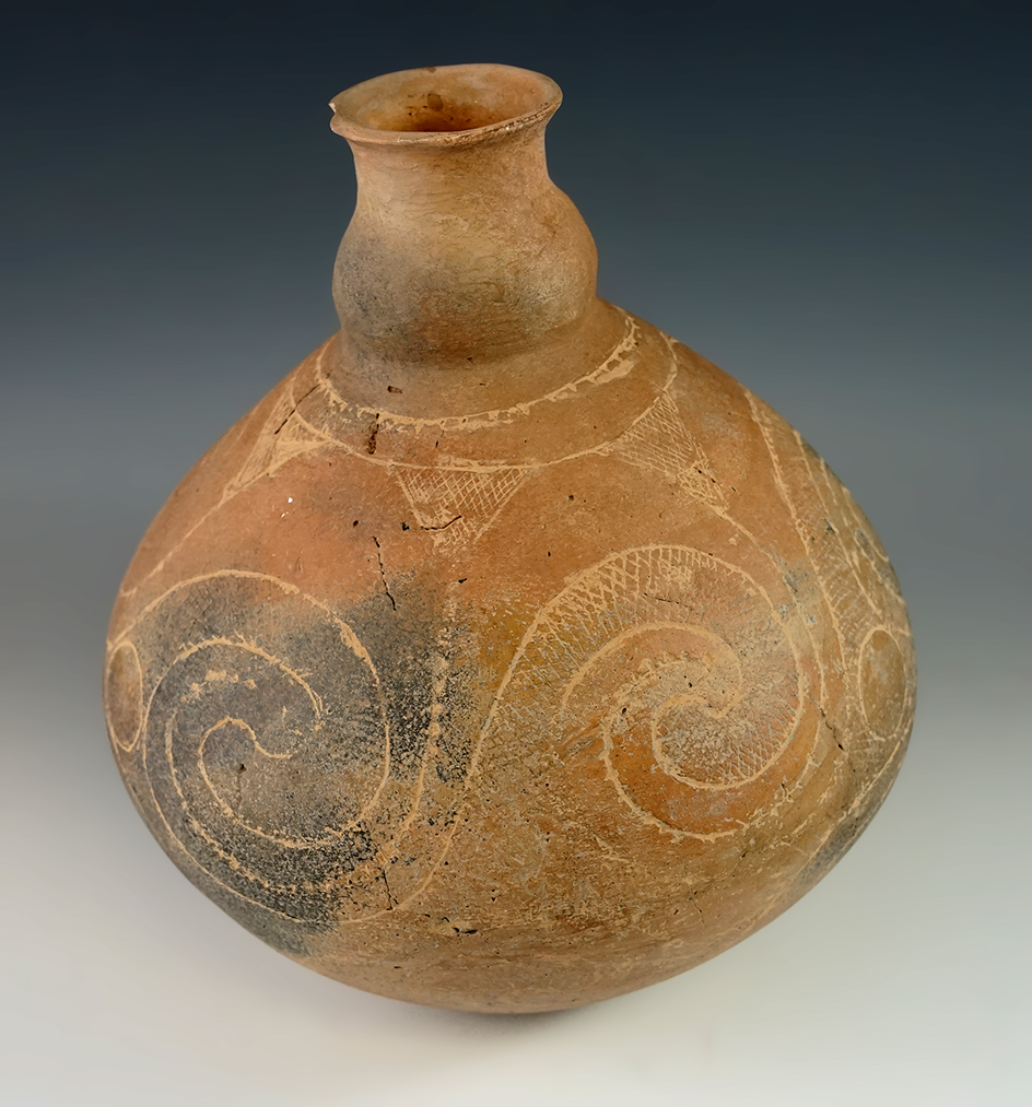 6 3/4" Wide nicely incised Water Bottle found near Hot Springs, Arkansas. With some restoration.