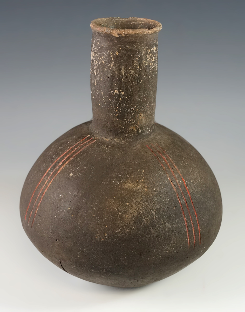 7" Tall Caddo Incised-line Bottle with some repair found in Arkansas.
