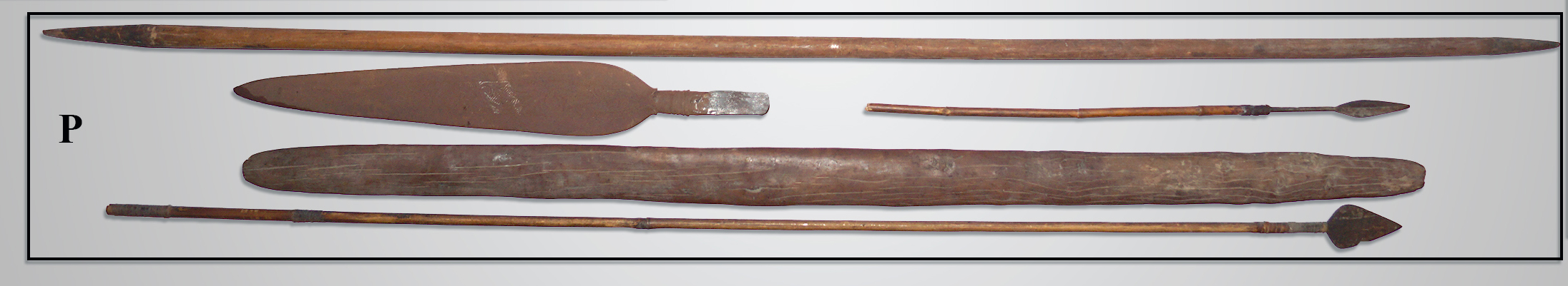 Group of old tribal artifacts, African or Island cultures. Included arrows, spears, tip, etc.