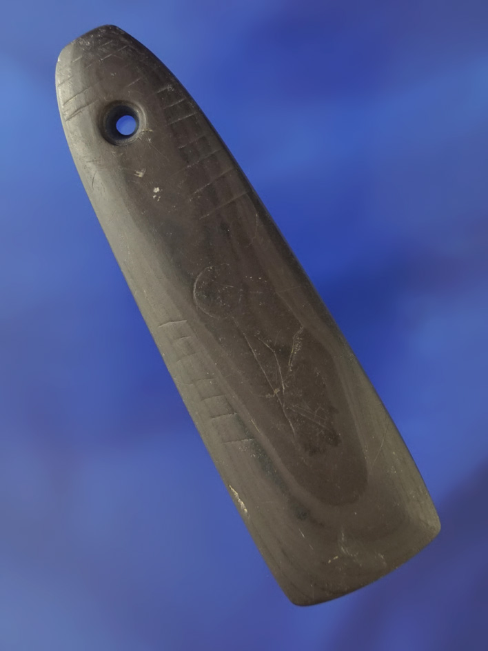 Heavily engraved surface on this 4 3/16" banded slate Pendant found in Barberton, Summit Co.,  OH