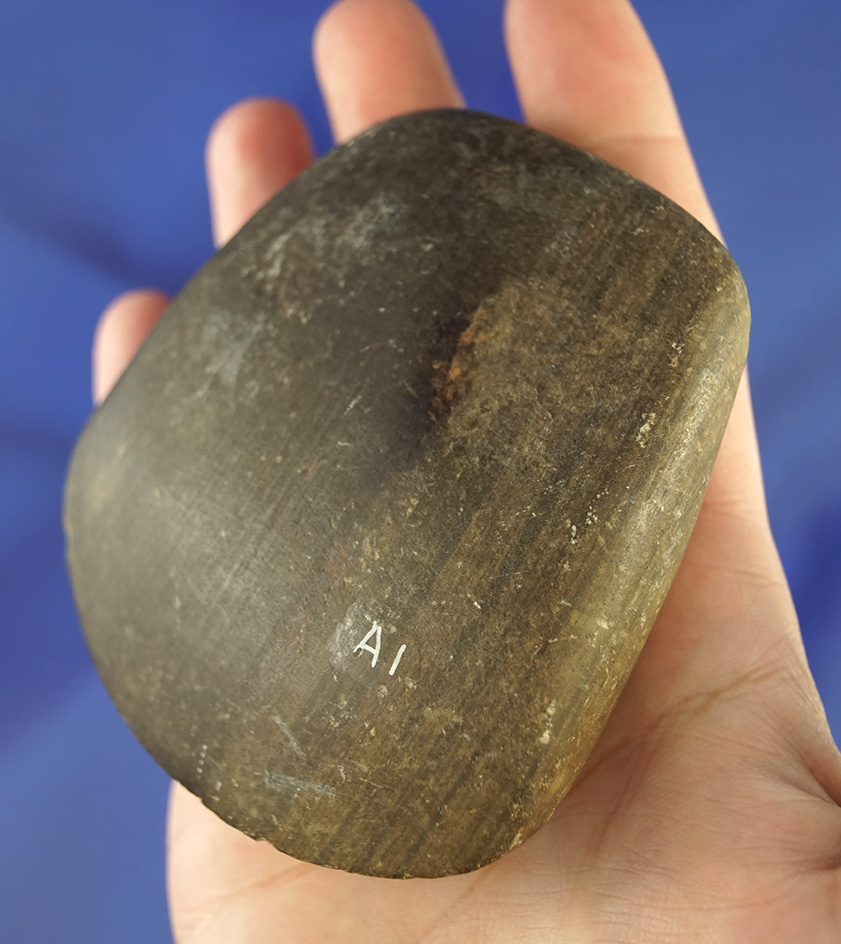 Highly polished 3 1/8" wide Midwestern Celt made from brown slate that is heavily patinated.