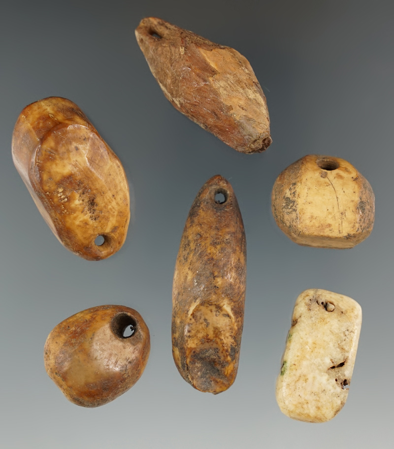 Set of six assorted Bolo weights, largest is 2 1/16".