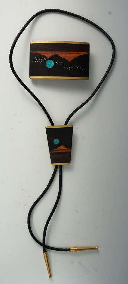 Contemporary Bolo tie and belt buckle stamped Kenneth Reed Albuquerque, New Mexico.