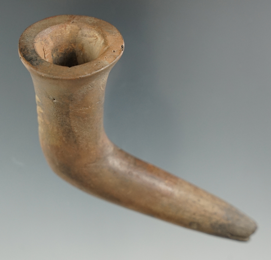 4" long Iroquois Clay Trumpet Pipe that is heavily restored but still makes a nice display item. NY