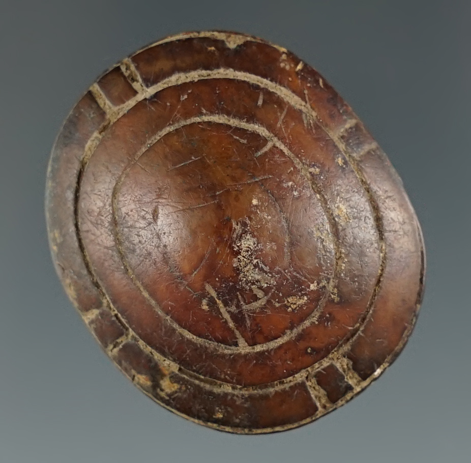 Very old 1 1/4" nicely carved Inuit ivory button with nice incised line design, recovered in Alaska.