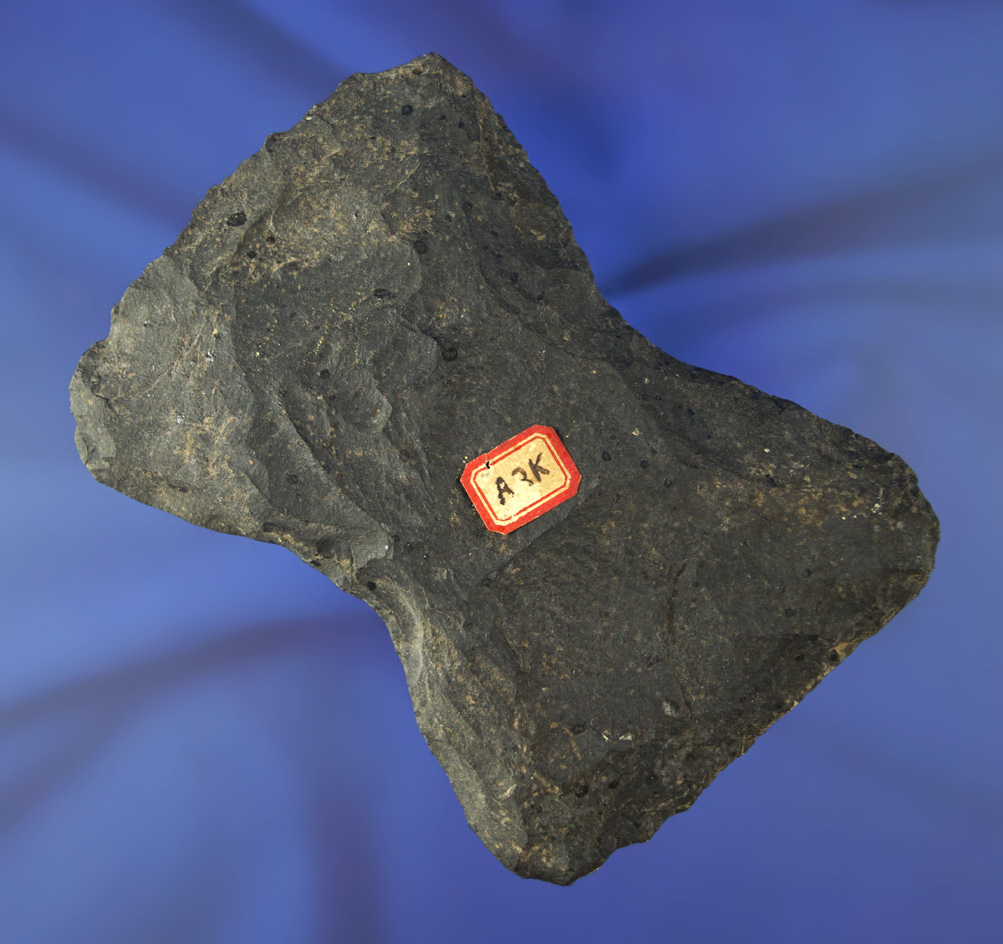 4" heavily patinated double bit Axe found in Arkansas.