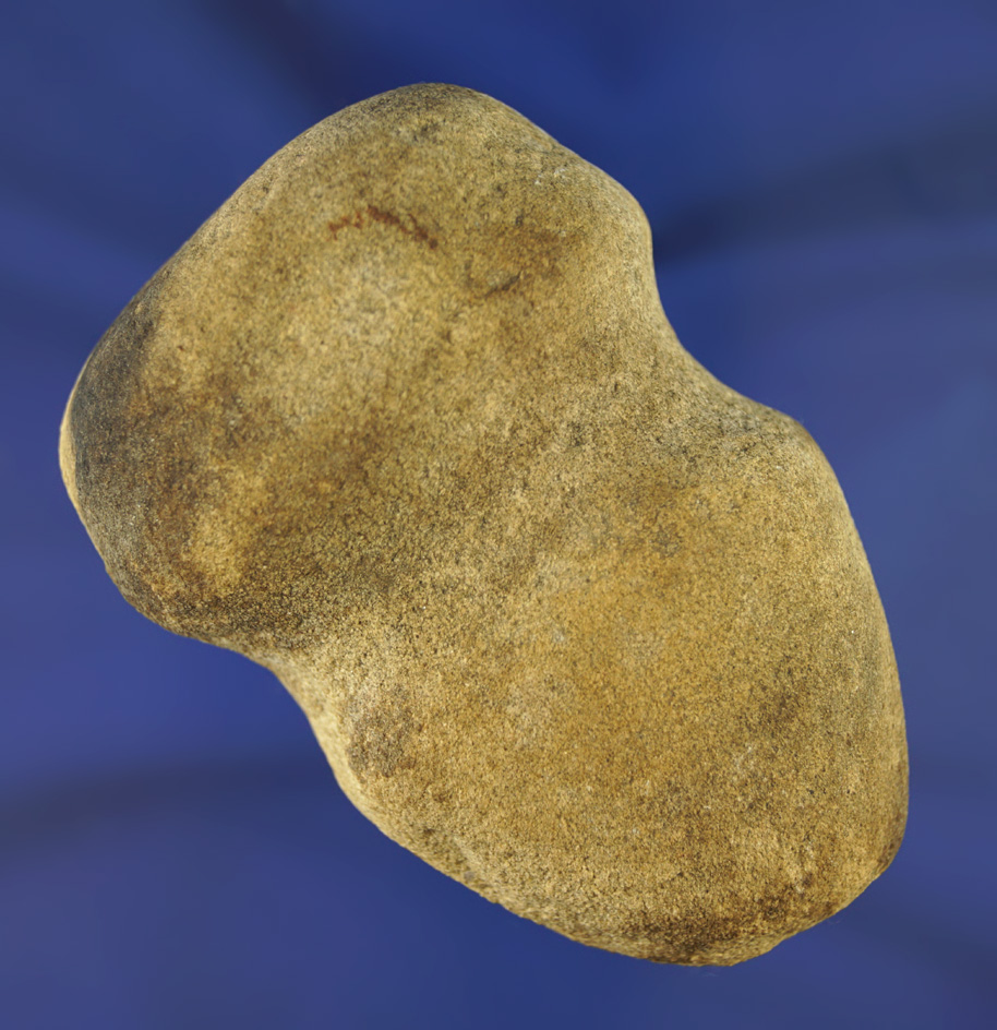 3 1/8" 3/4 grooved Hammerstone that is nicely styled from sandstone.  Michigan. Ex. Phil Waigel