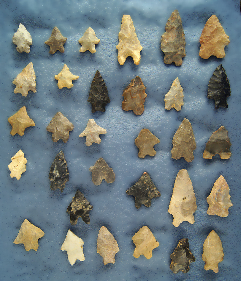 Nice selection of 31 Bifurcate Base Arrowheads  found in southern Michigan.