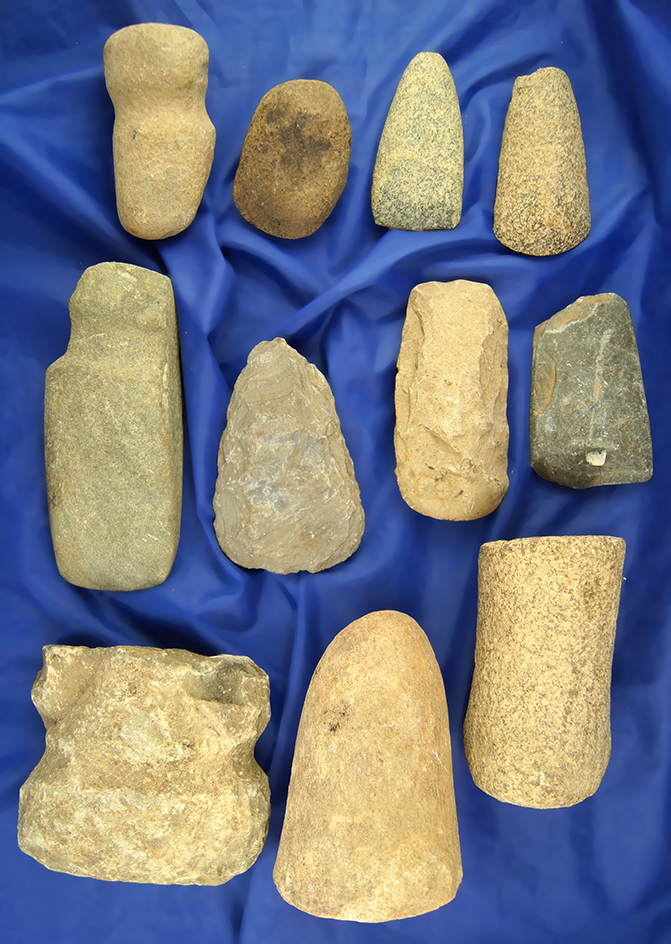Group of 11 assorted field found stone artifacts including Axes, Pestles and Celts.