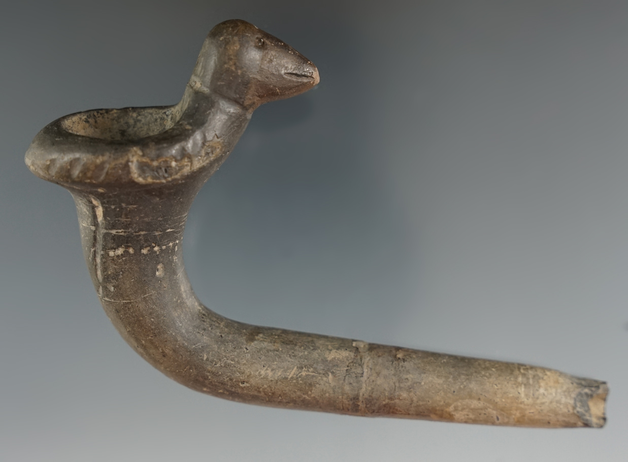 5" Long x 3" Tall bird effigy Iroquois Clay Pipe with a broken and reglued stem. Jefferson Co., NY