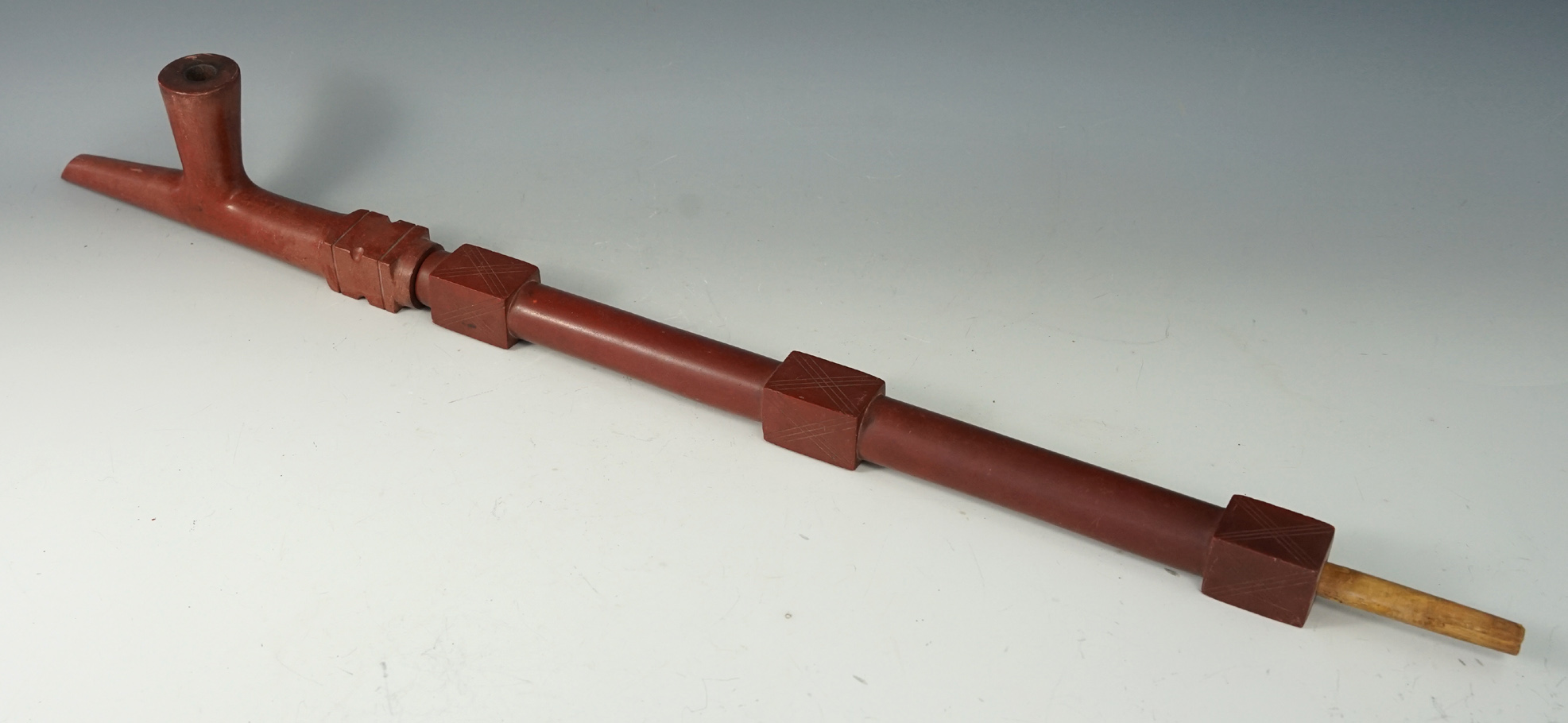 Large 2 piece Catlinite Pipe and Stem that measures 20 7/8" long. Very nicely crafted.