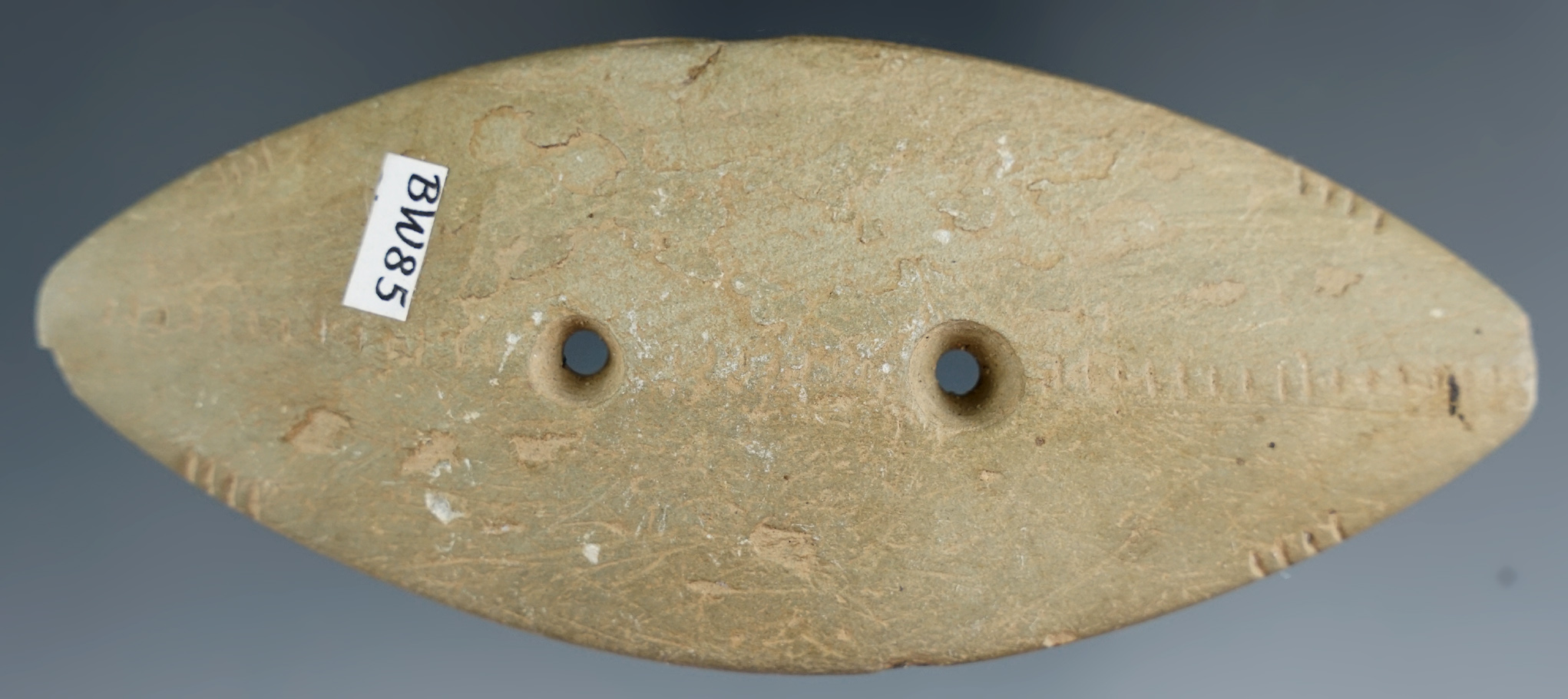 Unique 4 11/16" Bi-pointed Slate Gorget with extensive tally marks on surface. Ex. William Waigle.