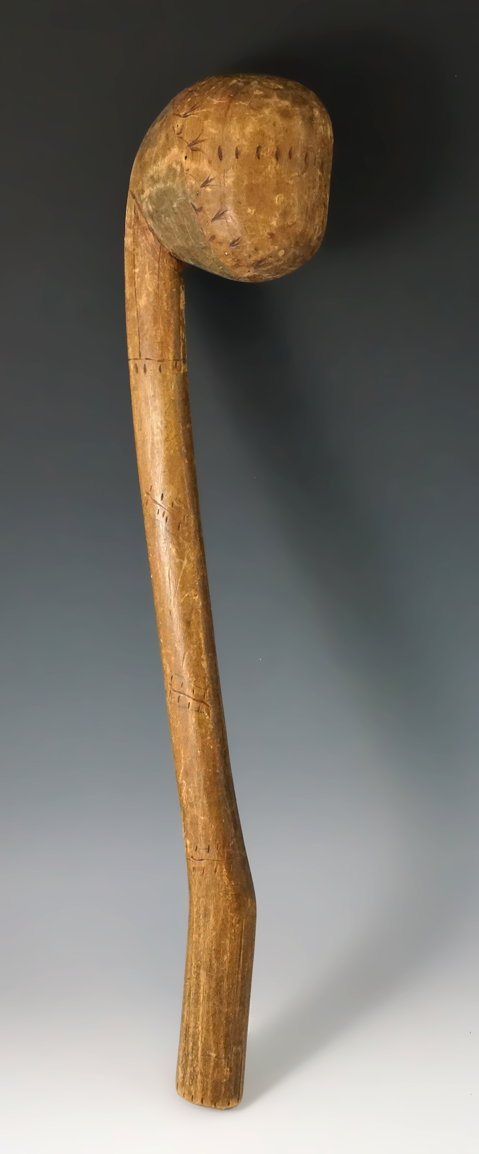 18 1/2" Seneca and carved wooden Seneca Ball Club with engraved design from New York.