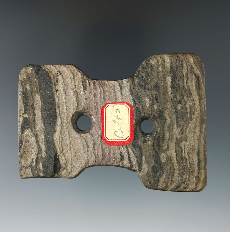 Rare style 3 1/4" Reel Gorget found in Michigan. The slate has been heavily weathered.