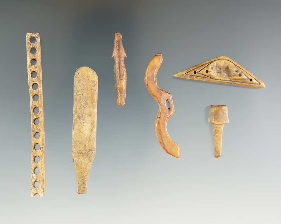 Set of six nicely crafted assorted Inuit bone and ivory artifacts. Largest is 2 13/16." Found in Ala