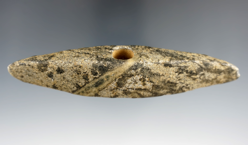 5 3/8" Bannerstone made from Steatite found in New York. Comes with a Bennett COA.