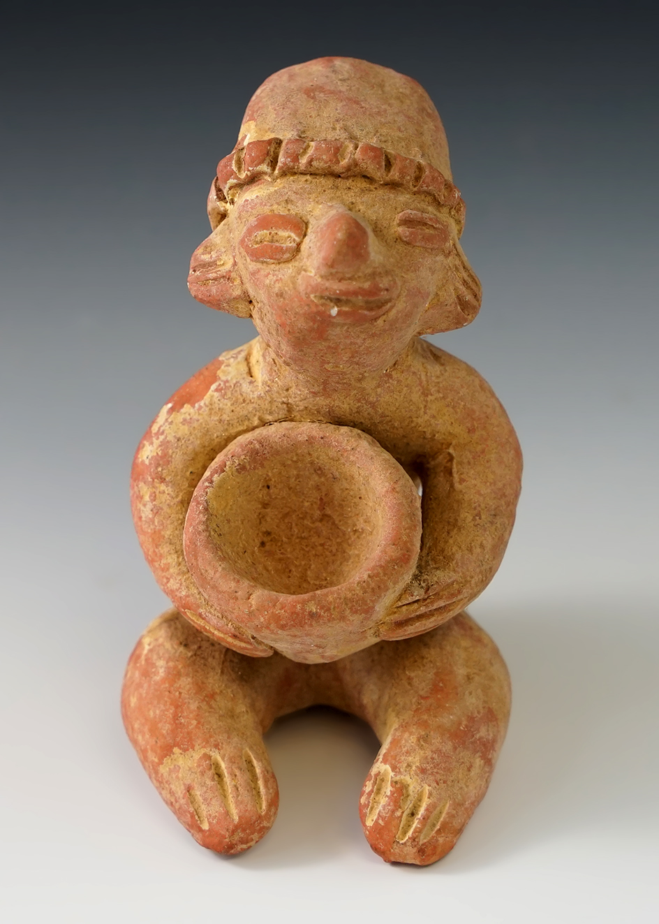 4 1/8" Tall nicely detailed Pre-Columbian Pottery Figure from Mexico in very good condition.