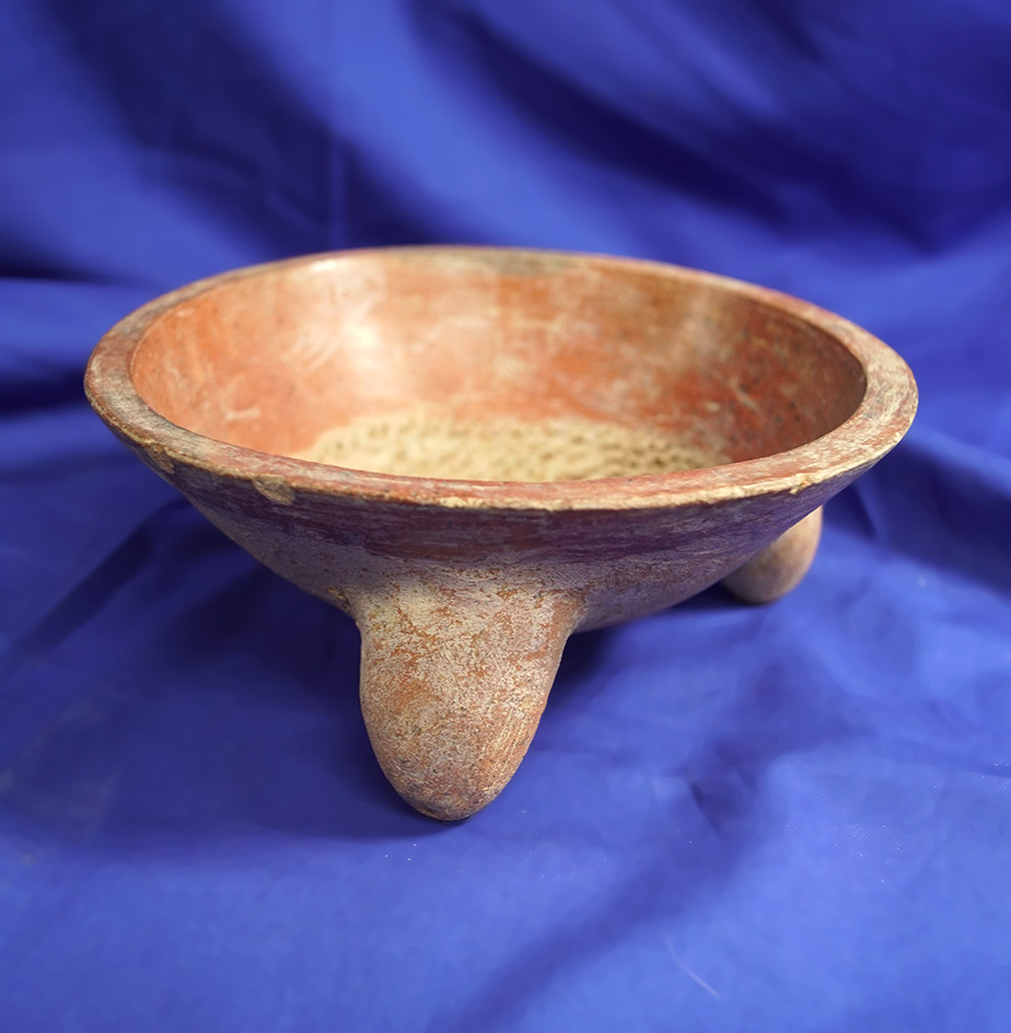 6 1/4" wide pre-Columbian tripod vessel with unique punctate design on interior.