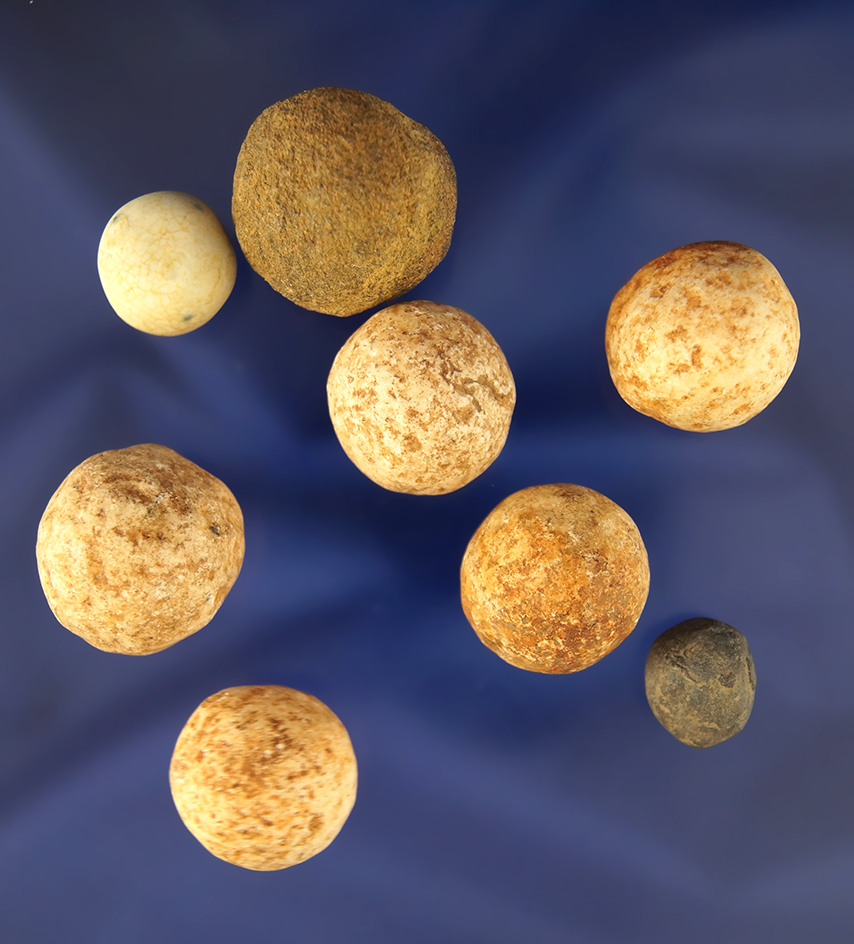 Set of eight game balls found in northern Alabama, largest is 7/8" diameter.