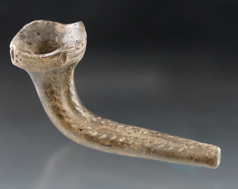 4 3/4" Long Huronian Clay Pipe with squared bowl and castellations. New York. Stem broken& glued.