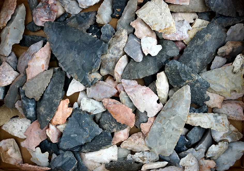 Box flat of damaged field found artifacts.