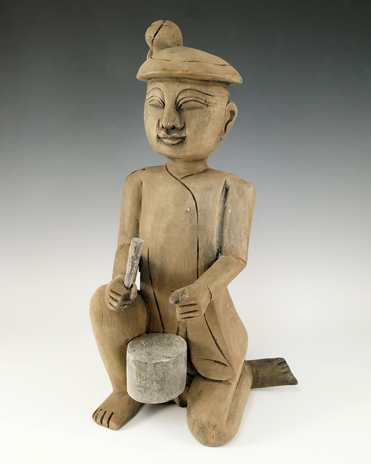 12" tall hand carved wood shaman from Malaysia.