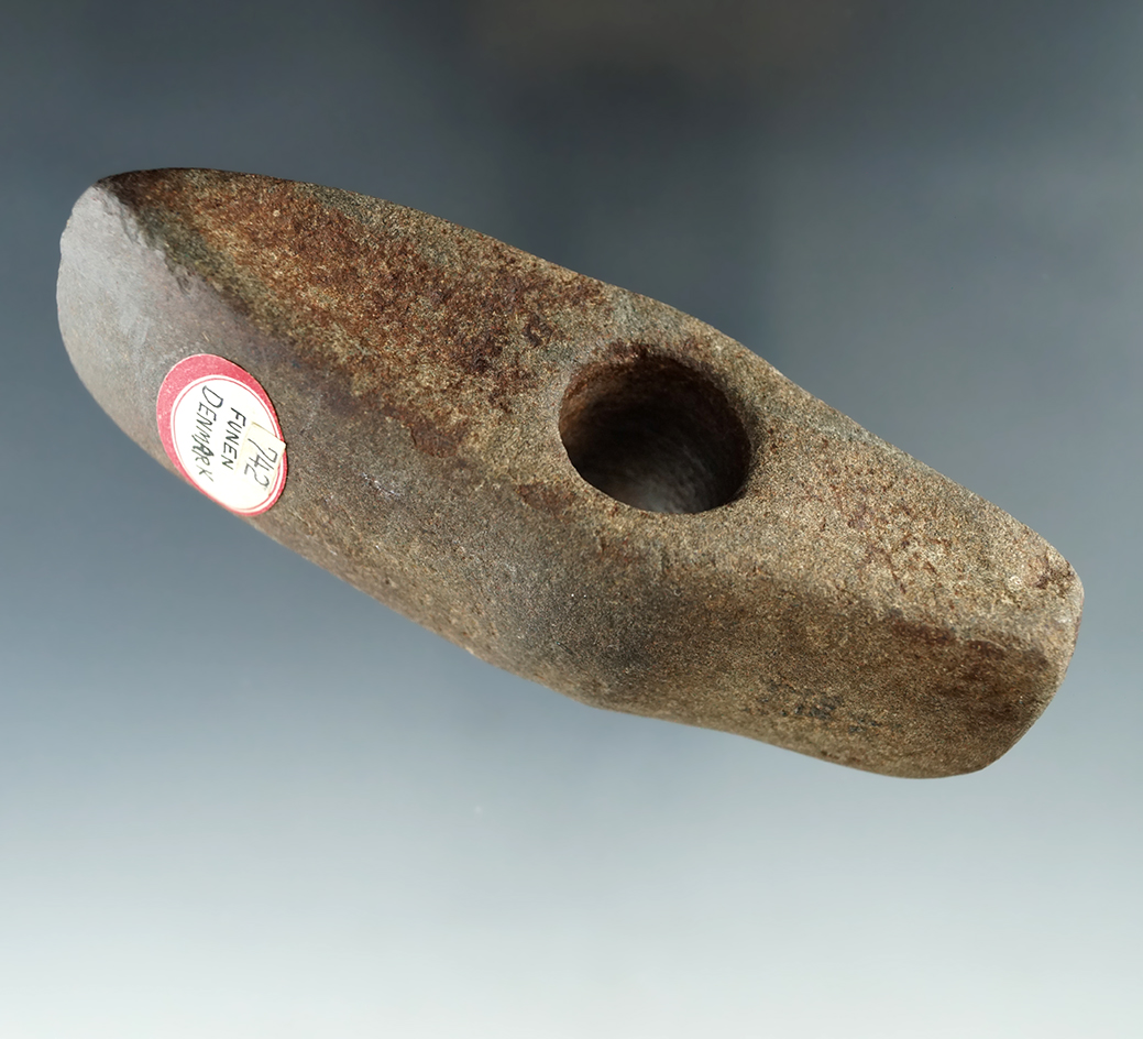 4 3/8" Drilled Stone Danish Axe found in Funen, Denmark. Very nicely styled, fluted top & bottom.