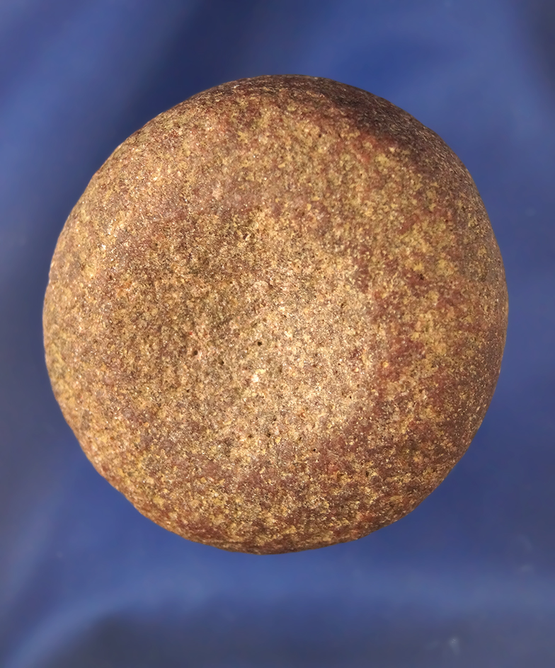 2 3/16" Double Cupped Discoidal made from red Quartzite and found in Ohio.