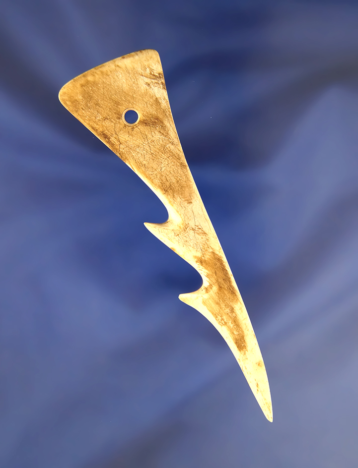 4 3/8" Bone Harpoon Tip that is perforated found in Alaska. Pictured  in Hothem's Antler Bone and Sh