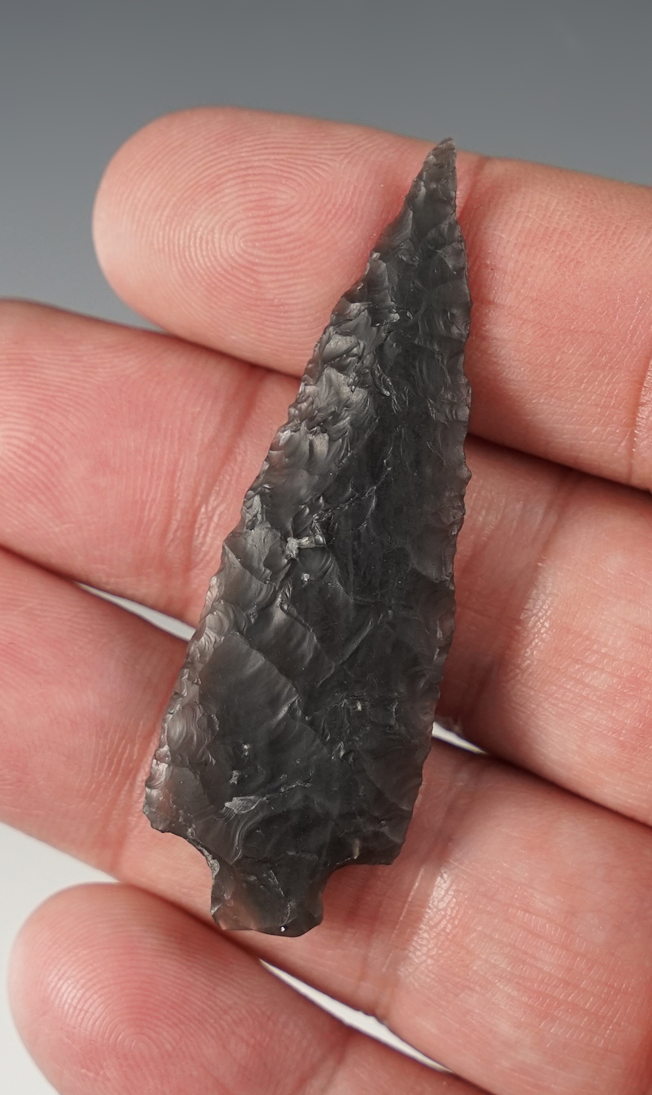 2 5/16" water polished obsidian point - well flaked and nicely styled. Lake County Oregon.
